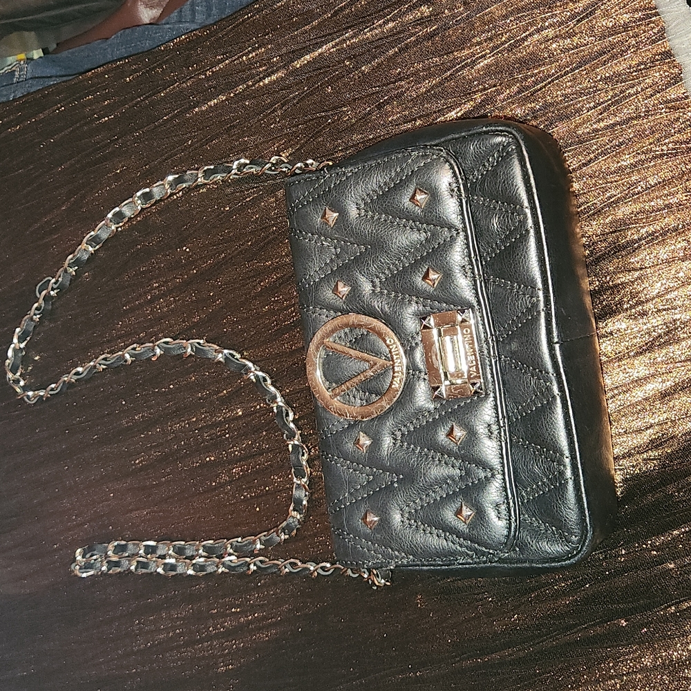 Valentino diamond rockstudded quilted leather cross body.